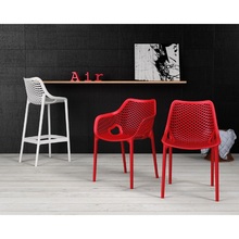 Nowoczesne Krzesło ażurowe z podłokietnikami AIR XL czerwone Siesta do kuchni, jadalni i salonu.