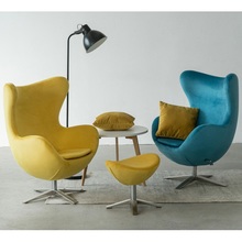 Designerski Fotel welurowy z podnóżkiem Jajo Velvet żółty D2.Design do salonu i sypialni.