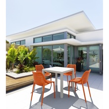 Nowoczesne Krzesło ażurowe z tworzywa AIR pomarańczowe Siesta do kuchni, jadalni i salonu.
