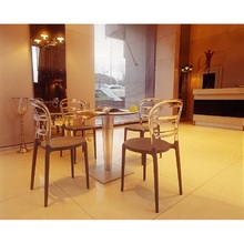 Stylowe Krzesło z tworzywa MISS BIBI czarne/bursztynowe przezroczyste Siesta do salonu, kuchni i restuaracji.