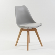 Stylowe Krzesło skandynawskie z poduszką Kris jasno szary/dąb Signal do kuchni, salonu i restauracji.