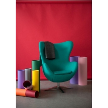 Fotel obrotowy z podnóżkiem Jajo szeroki wełna zielona D2.Design